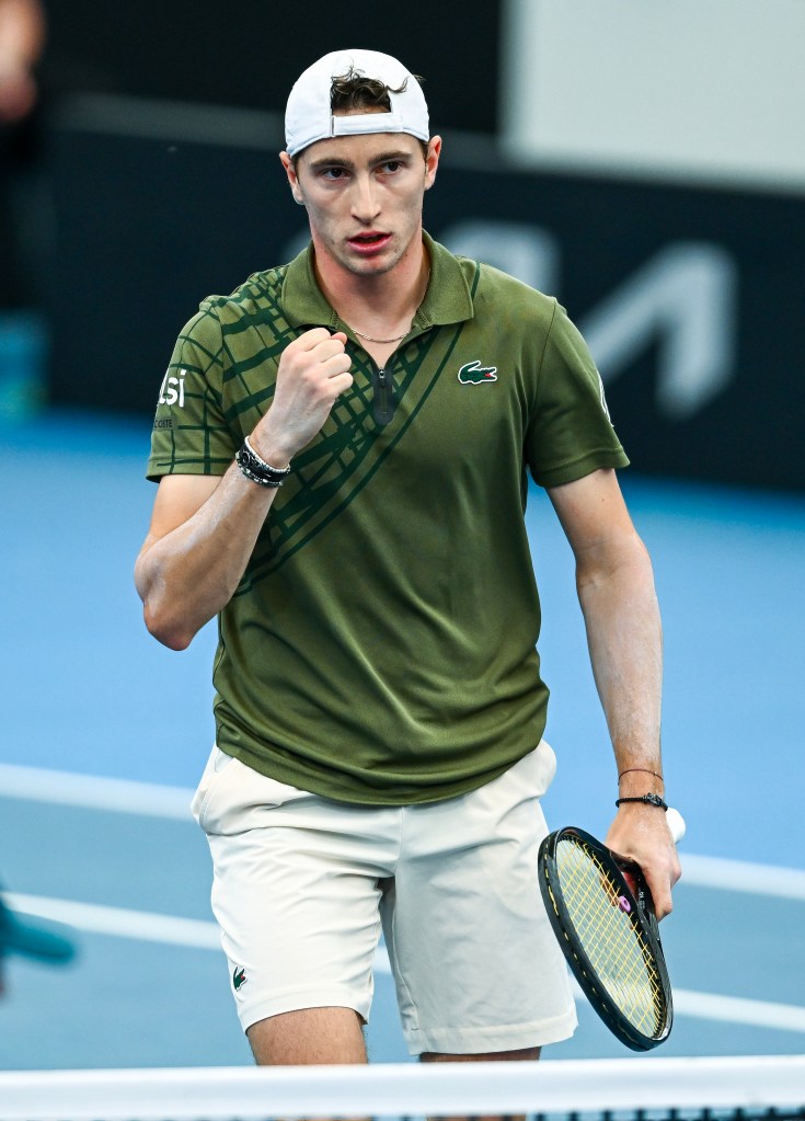Ugo Humbert celebrates winning a game at the 2026 Adelaide International.