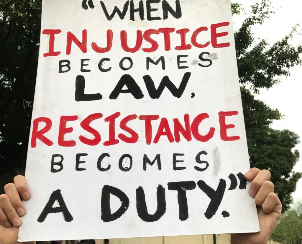 Governments who fail to address their citizens’ concerns may find themselves toppled by popular protest movements. Photo by Vic Alcuaz on Unsplash.