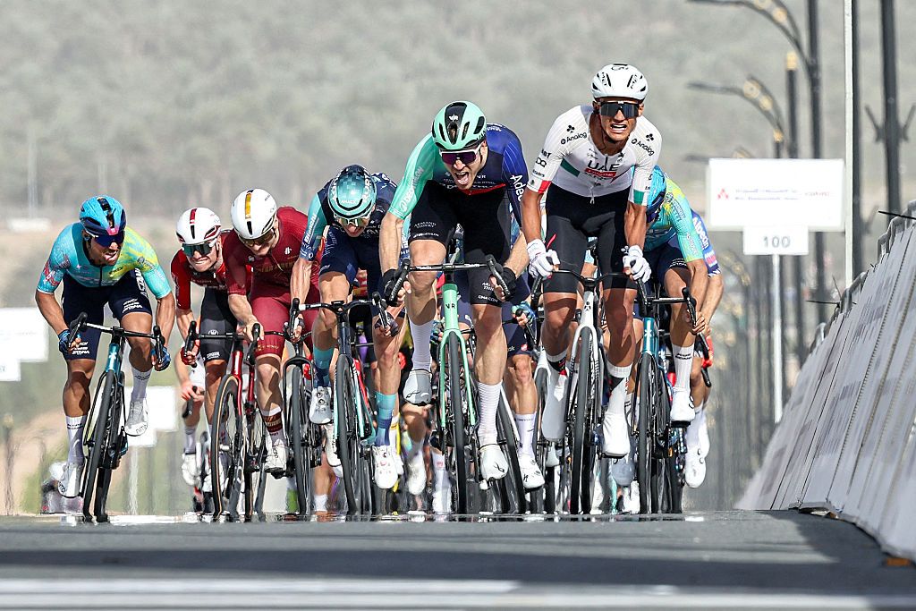 UAE Team Emirates's Mexican rider Isaac Del Toro Romero leads the pack while approaching the finish line during the first stage of the UAE Tour cycling event from Madinat Zayed Majlis to Liwa Palace in Abu Dhabi on February 16, 2026. (Photo by Fadel SENNA / AFP)