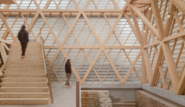 glass shingles wrap timber-framed museum by wulf architekten