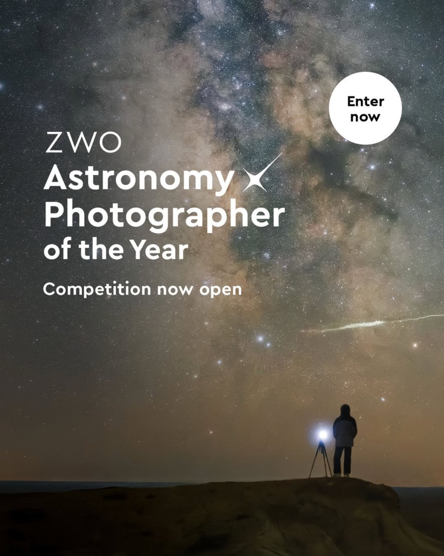 A silhouetted photographer stands on a rocky outcrop, capturing the starry night sky, promoting the ZWO Astronomy Photographer of the Year competition