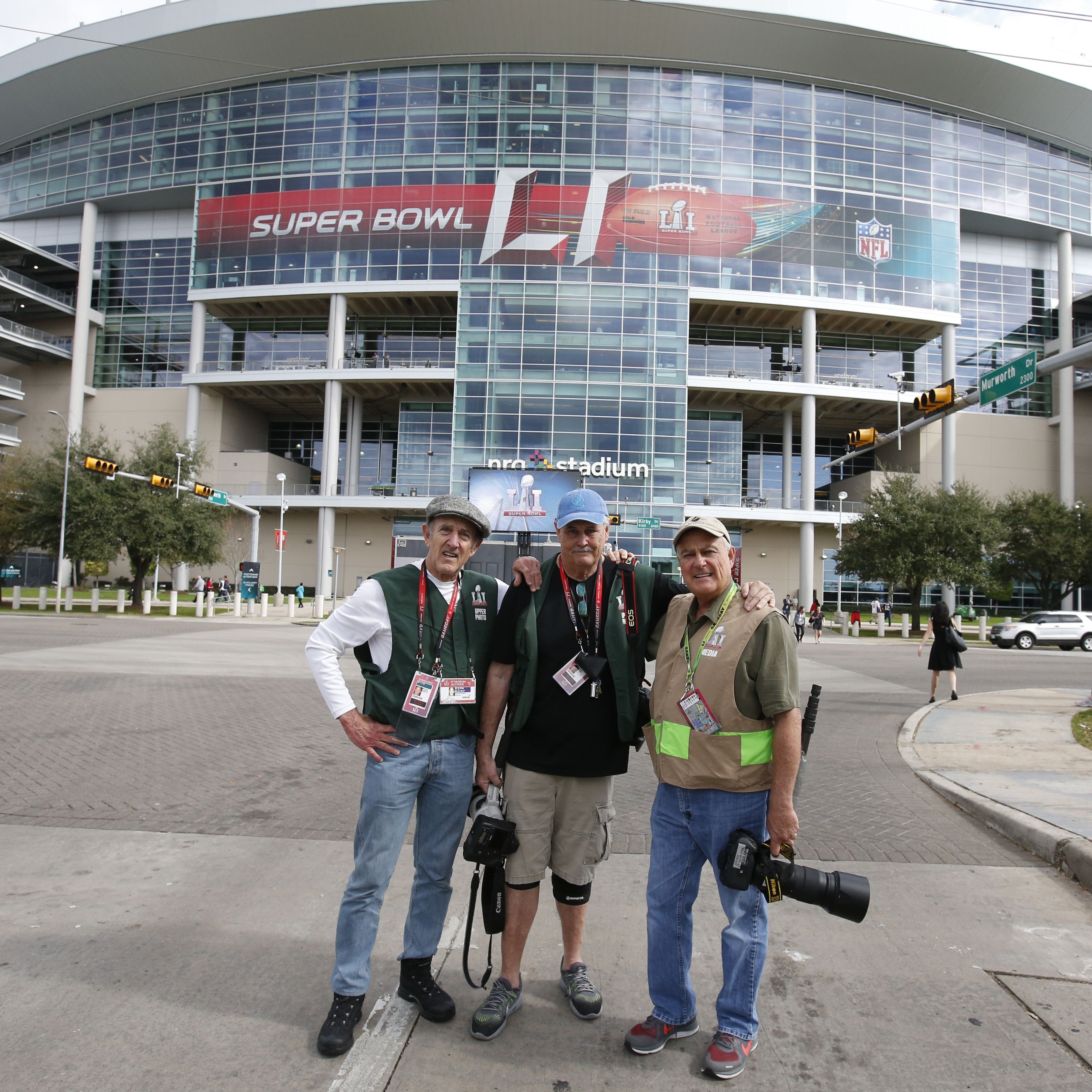 HOUSTON, TX - FEBRUARY 5: Photographers Michael Zagaris, Peter Read Miller and John Biever stand in front of NRG Stadium prior to Super Bowl 51 between the Atlanta Falcons and the New England Patriots at NRG Stadium on February 5, 2017 in Houston, Texas. Between the three of the they have shot a combined 129 Super Bowls with Zagaris shooting 39, Miller shooting 39 and Biever shooting all 51 Super Bowls. (Photo by Michael Zagaris/Getty Images) *** Local Caption *** Michael Zagaris;Peter Read Miller, John Biever