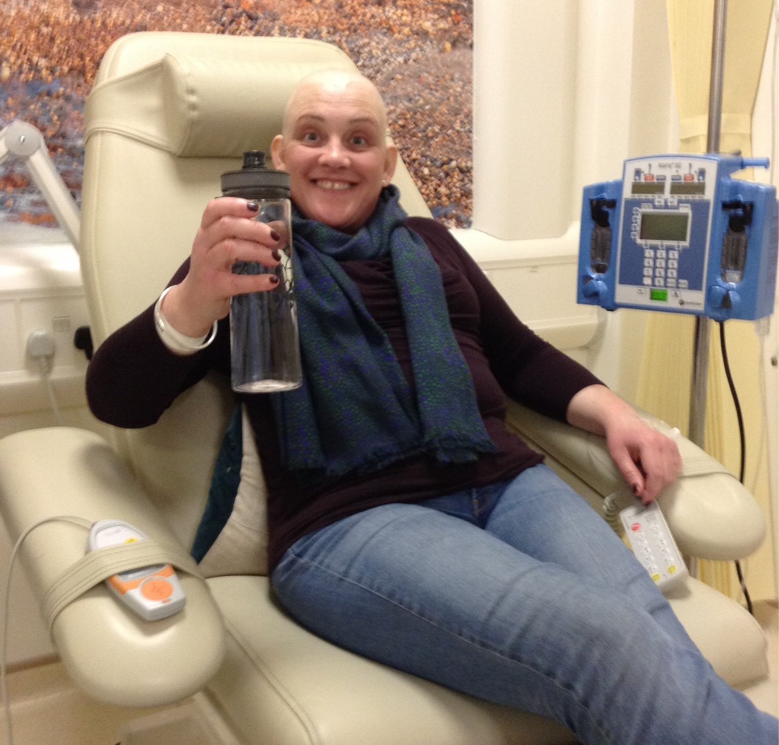 Ashley Dalton smiles while undergoing breast cancer treatment.