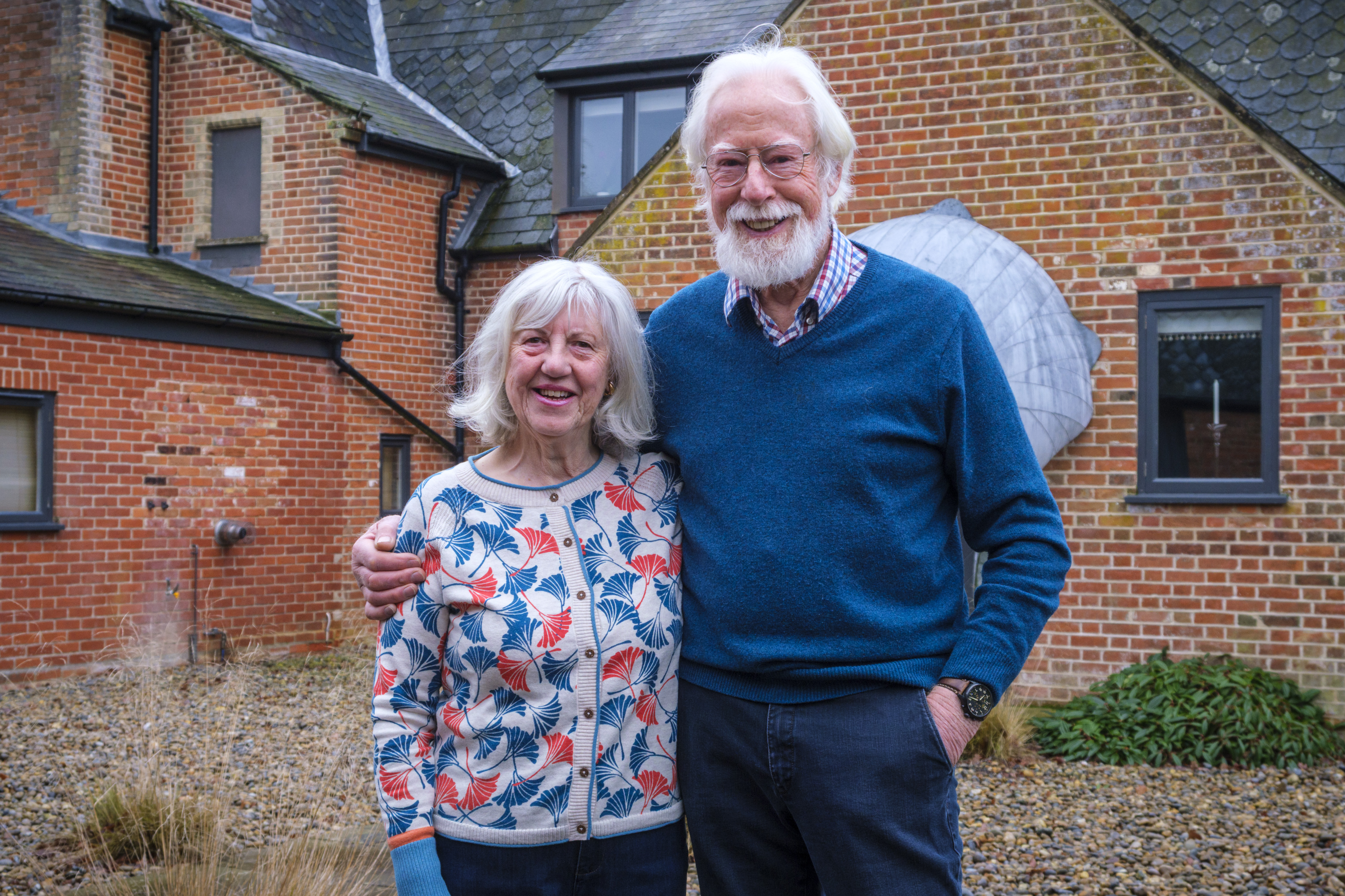 John and Marjorie Millbank in front of their farm in Halesworth, UK.