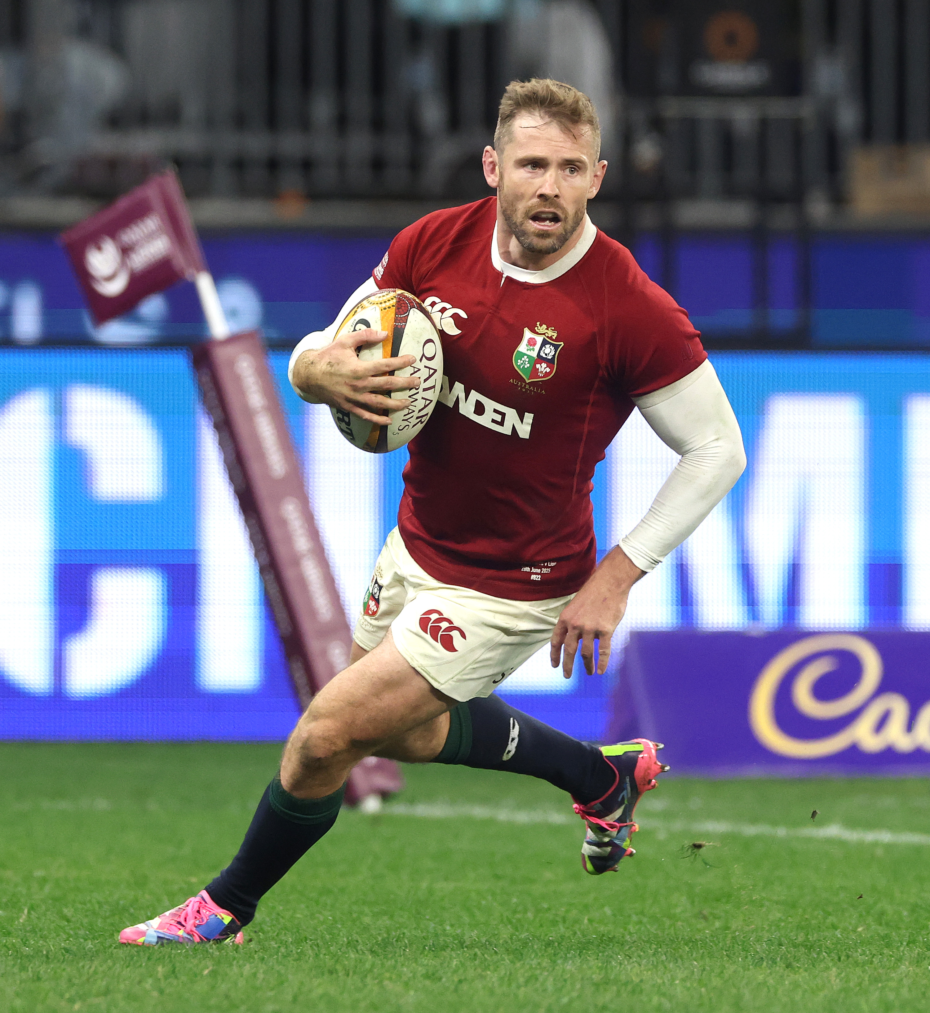 Elliot Daly of the British & Irish Lions scoring a try during a rugby match.
