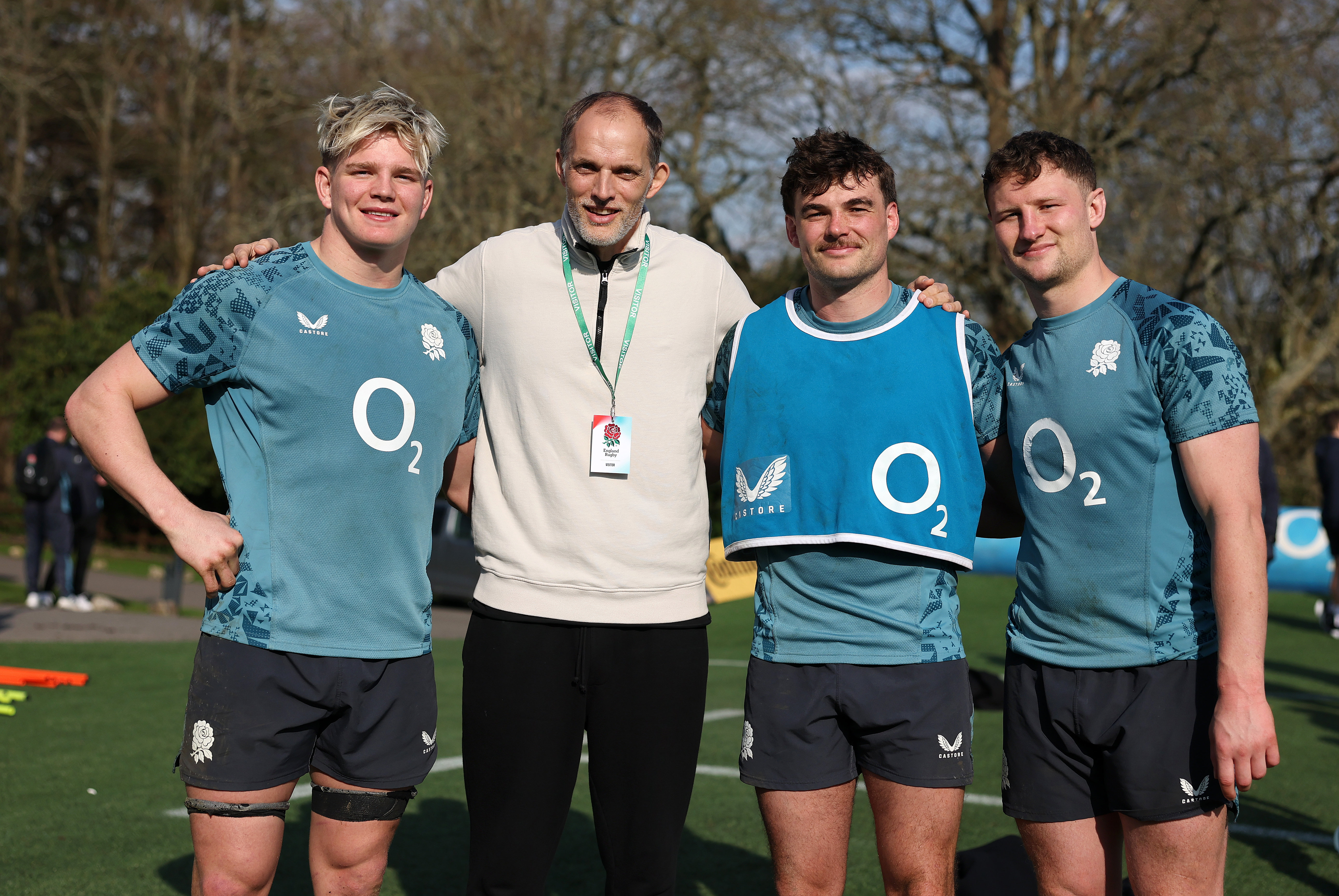 Henry Pollock, Thomas Tuchel, George Furbank and Fraser Dingwall following an England training session.