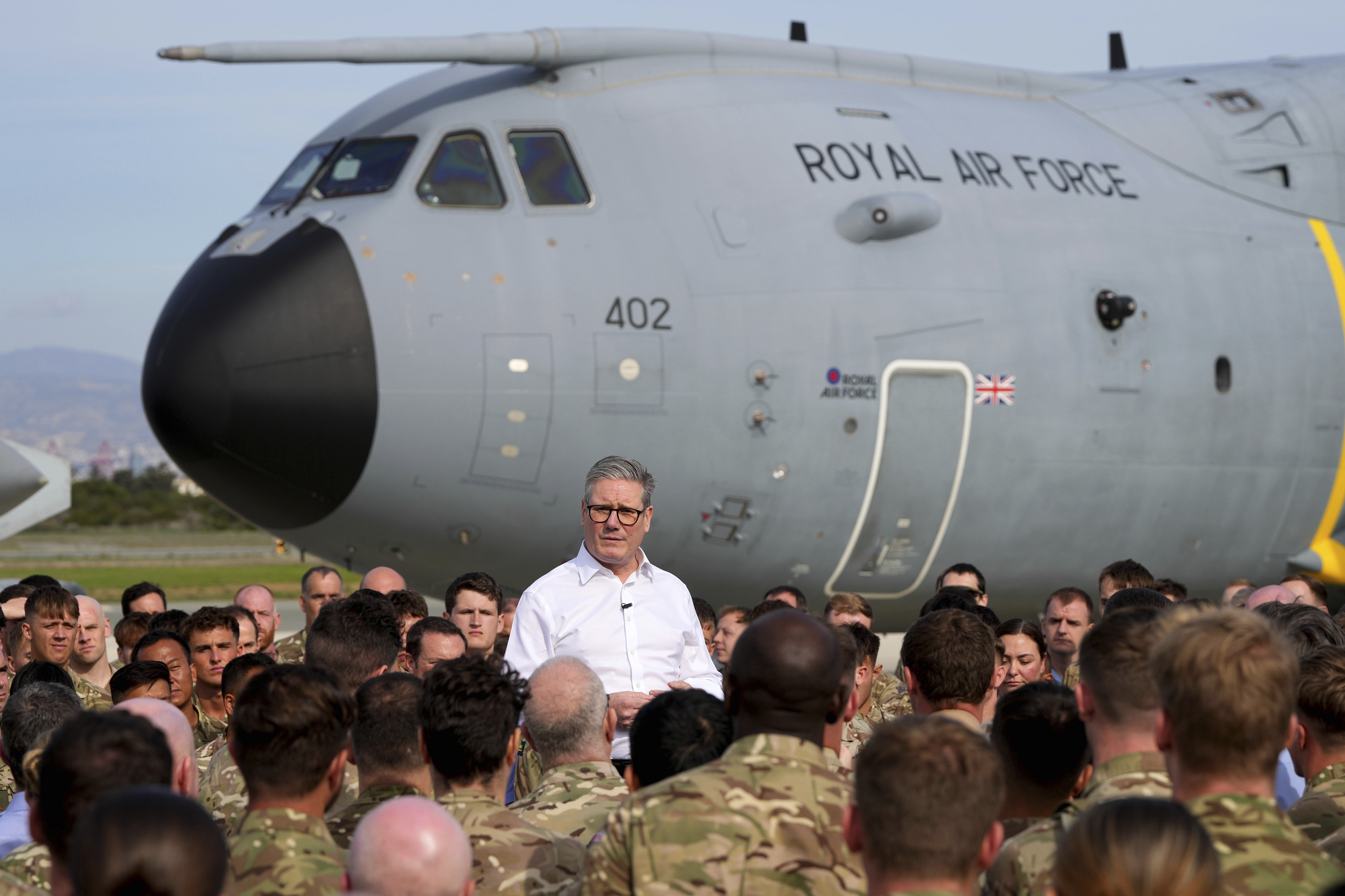 Britain's Prime Minister Keir Starmer speaking to soldiers at the RAF base in Akrotiri, Cyprus.