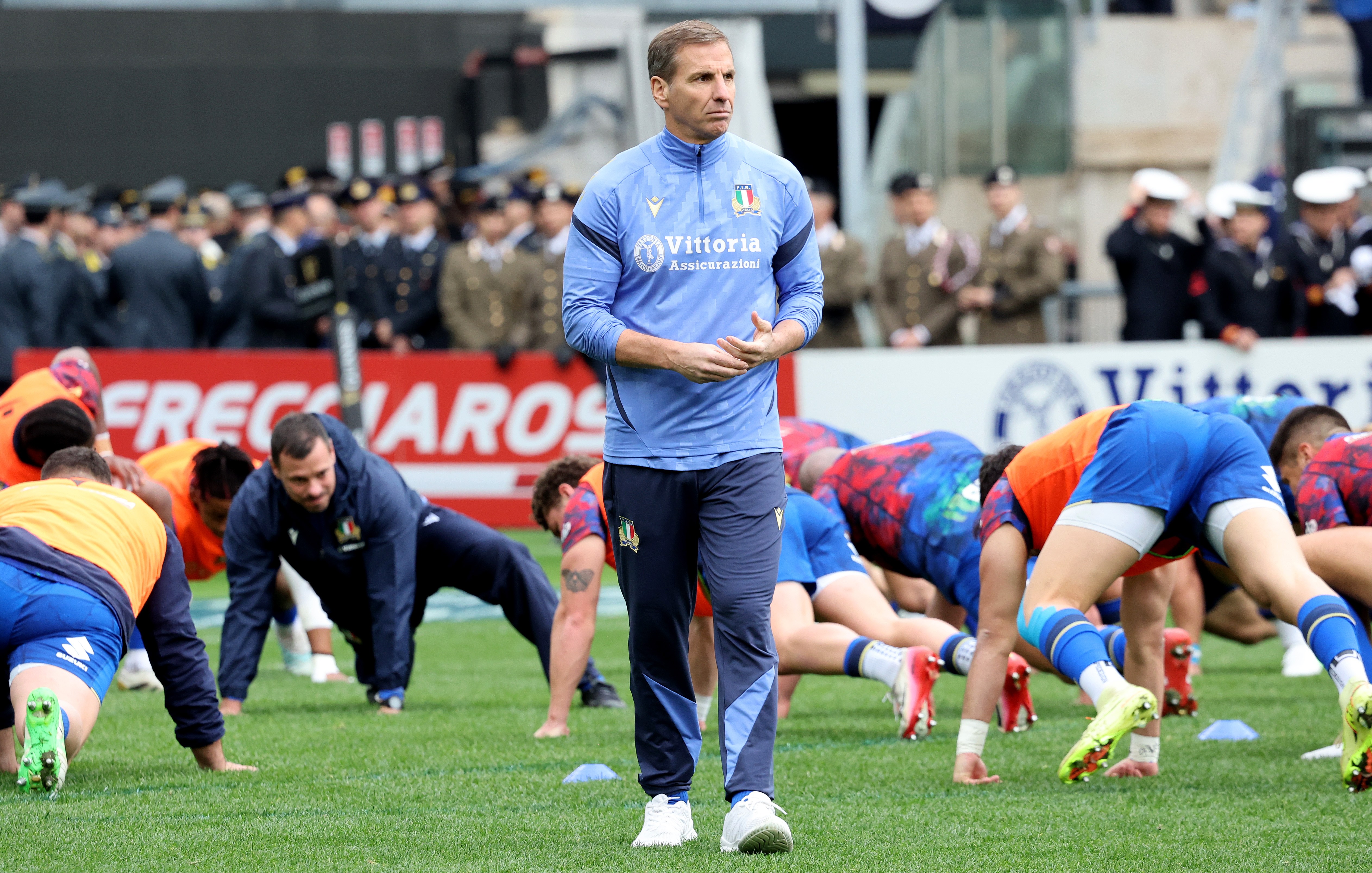 Head coach Gonzalo Quesada of Italy observes his team during warm-up.