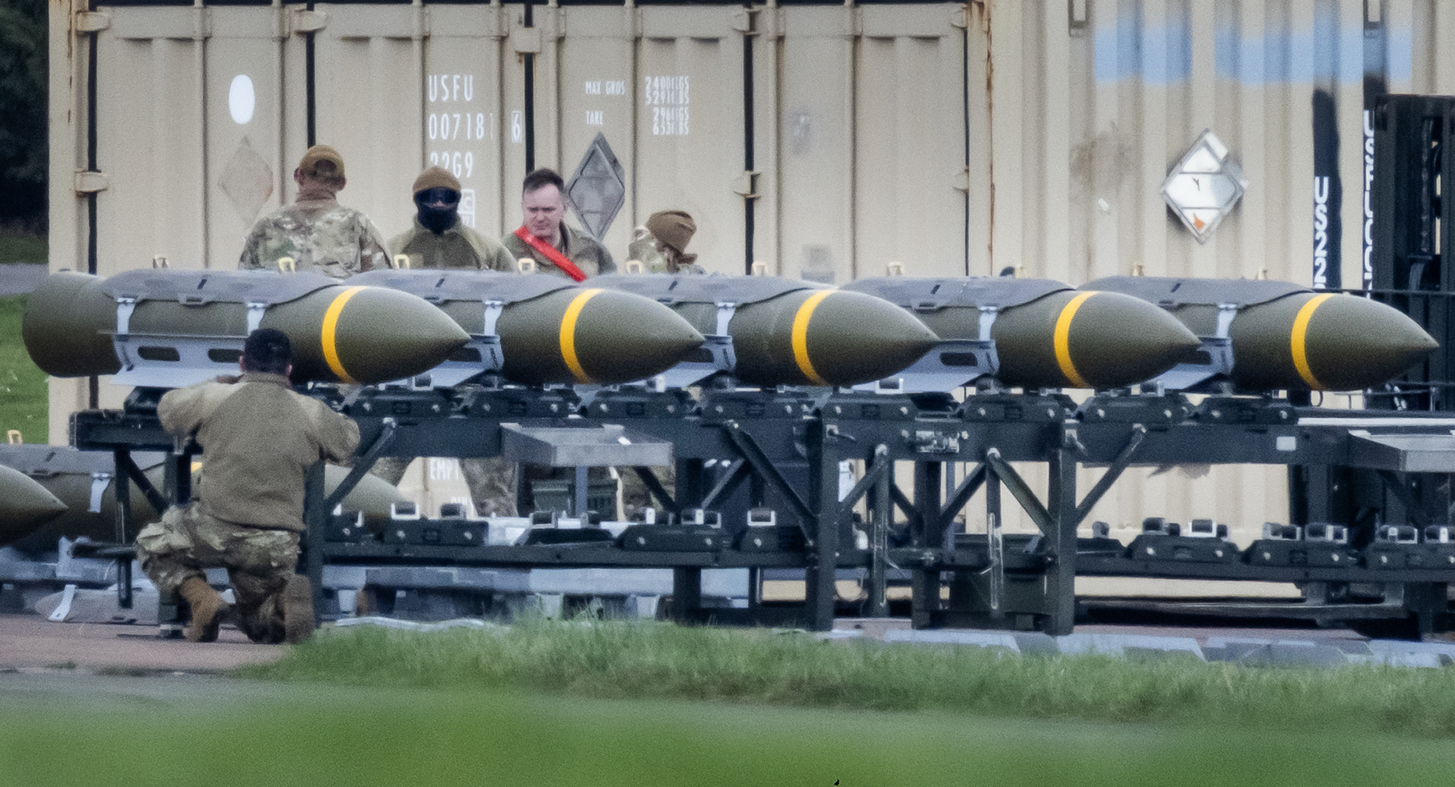 American military personnel assemble armaments at RAF Fairford in Gloucestershire. Three more B1-B bombers arrived overnight, bringing the total to eight