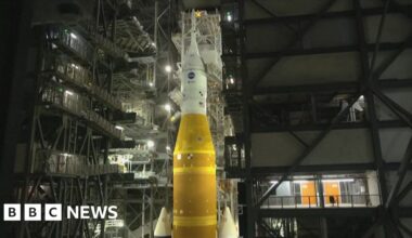 Artemis II rocket lit up at night