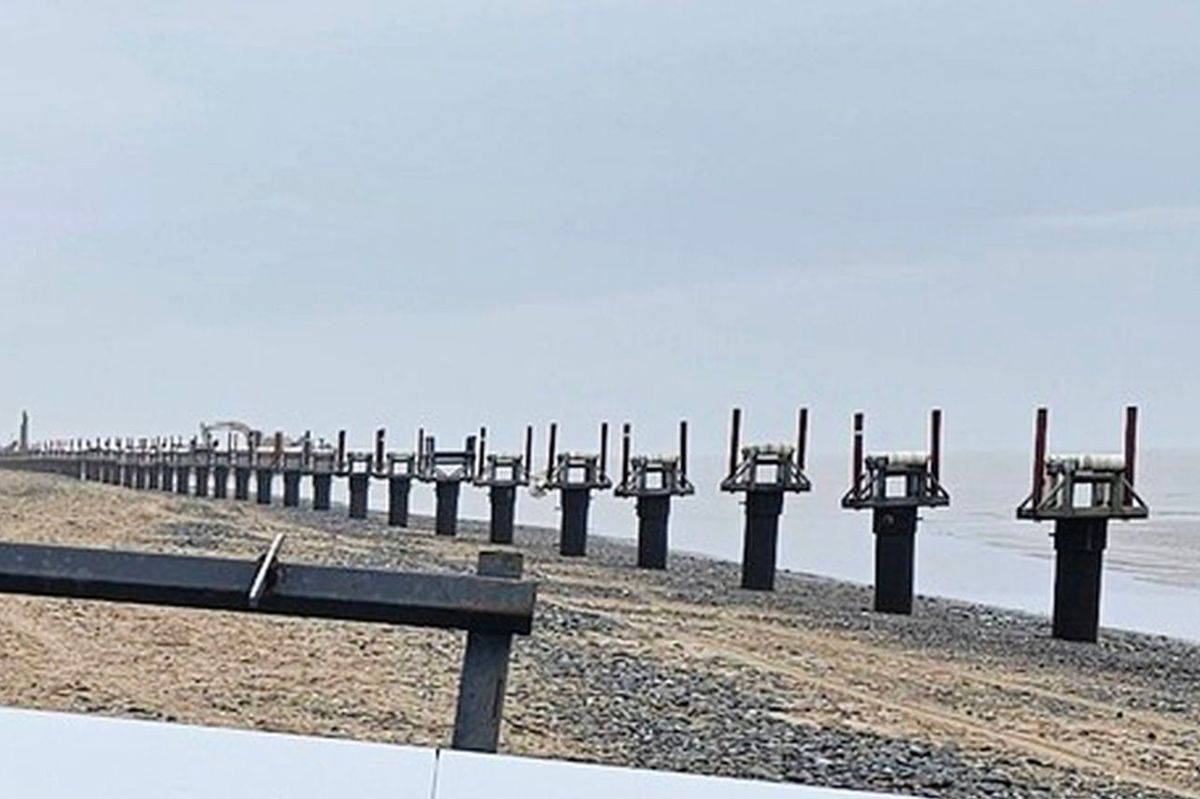 The steel stands disappear into the distance