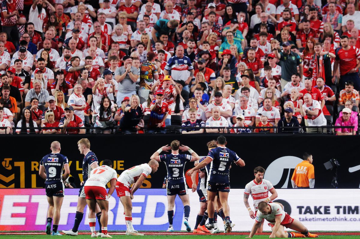 Harry Newman of Leeds celebrates in front of the Hull KR fans