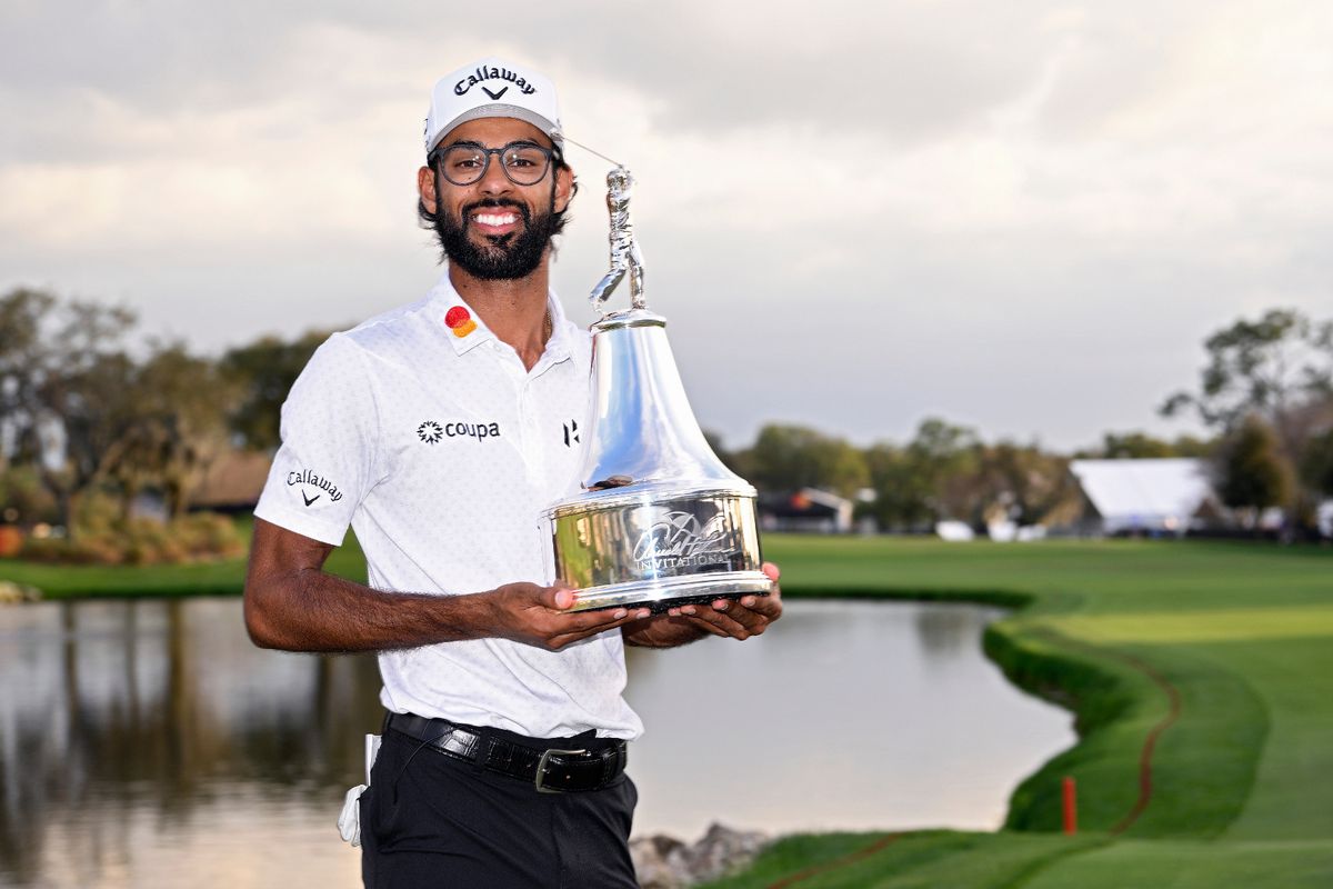 Akshay Bhatia with the trophy after winning the Arnold Palmer Invitational presented by Mastercard 2026 in a playoff. 