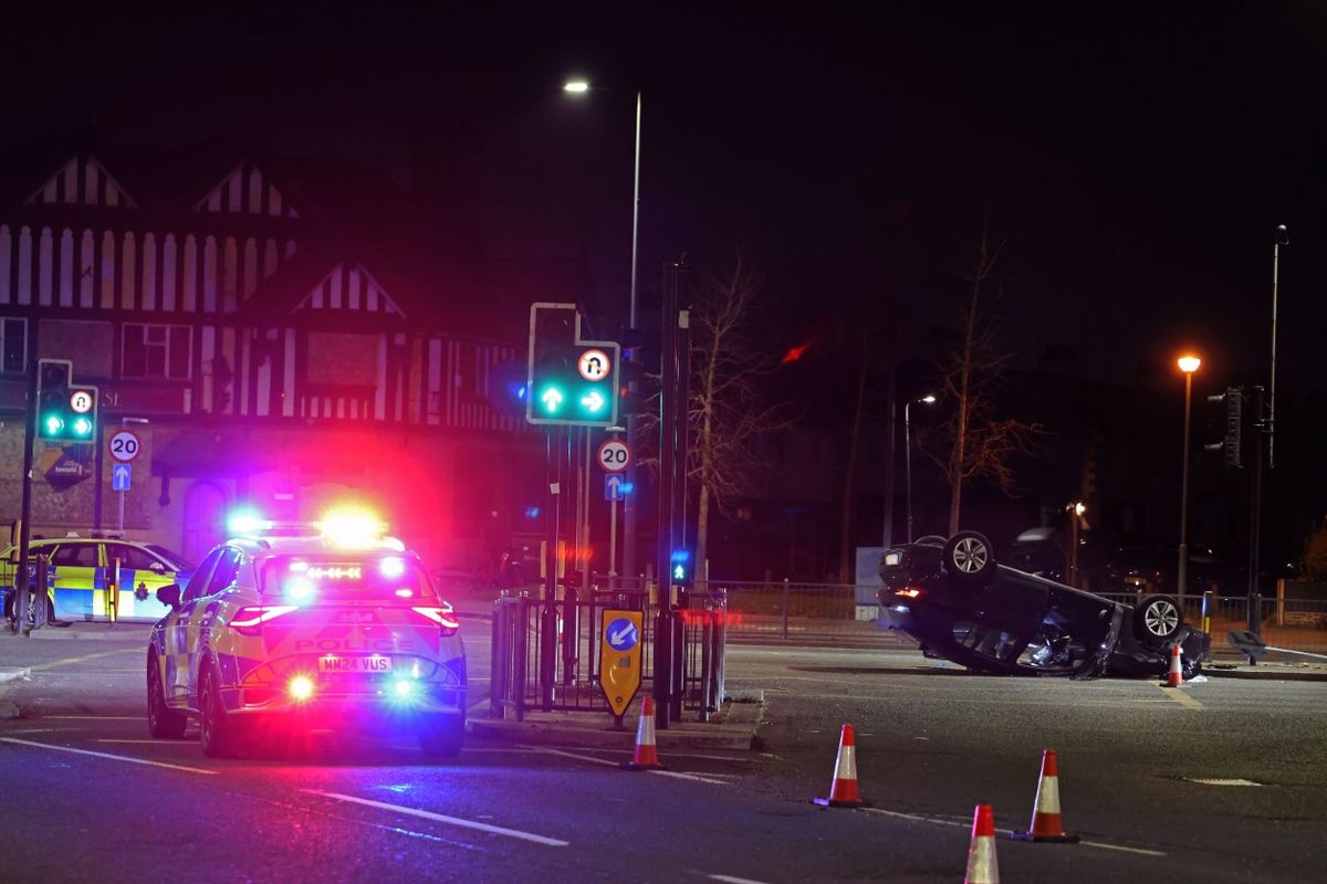 Police at the scene of the crash on Edge Lane