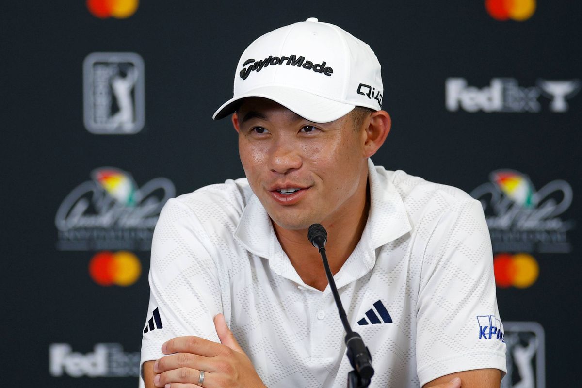 Collin Morikawa speaks with members of the media