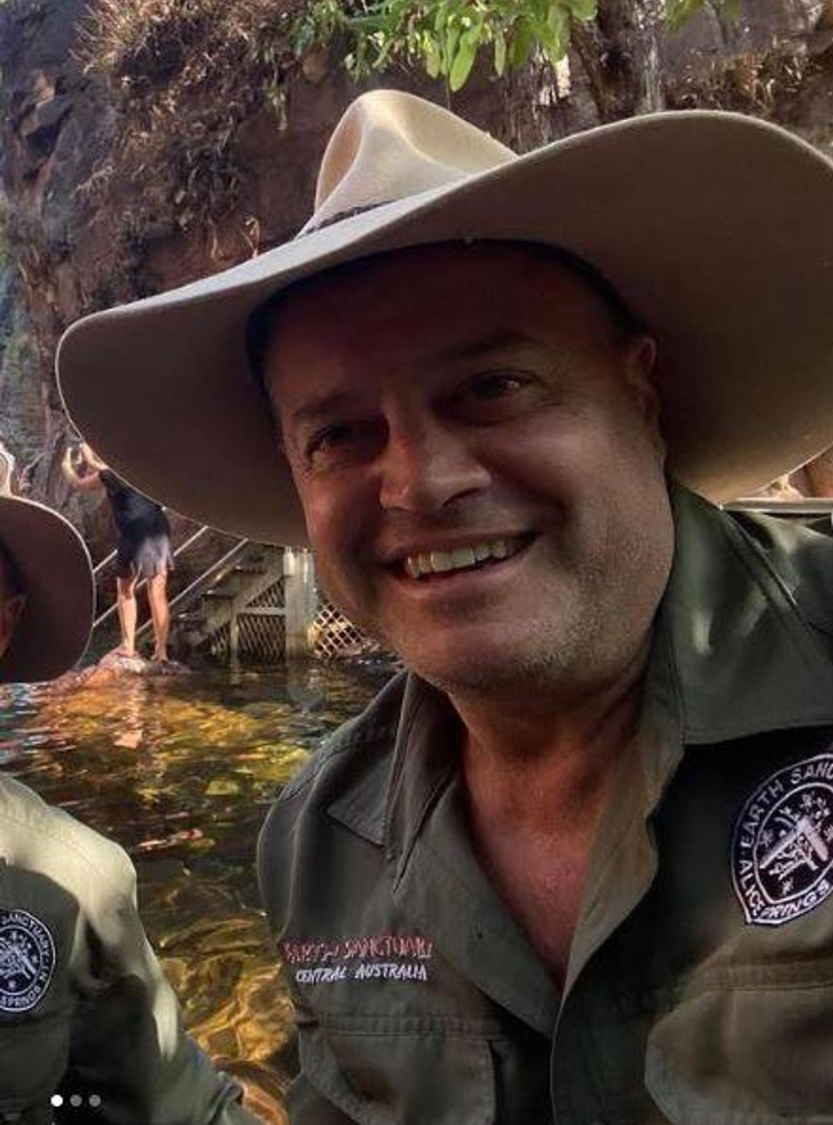 Dan Falzon poses for a selfie next to a river