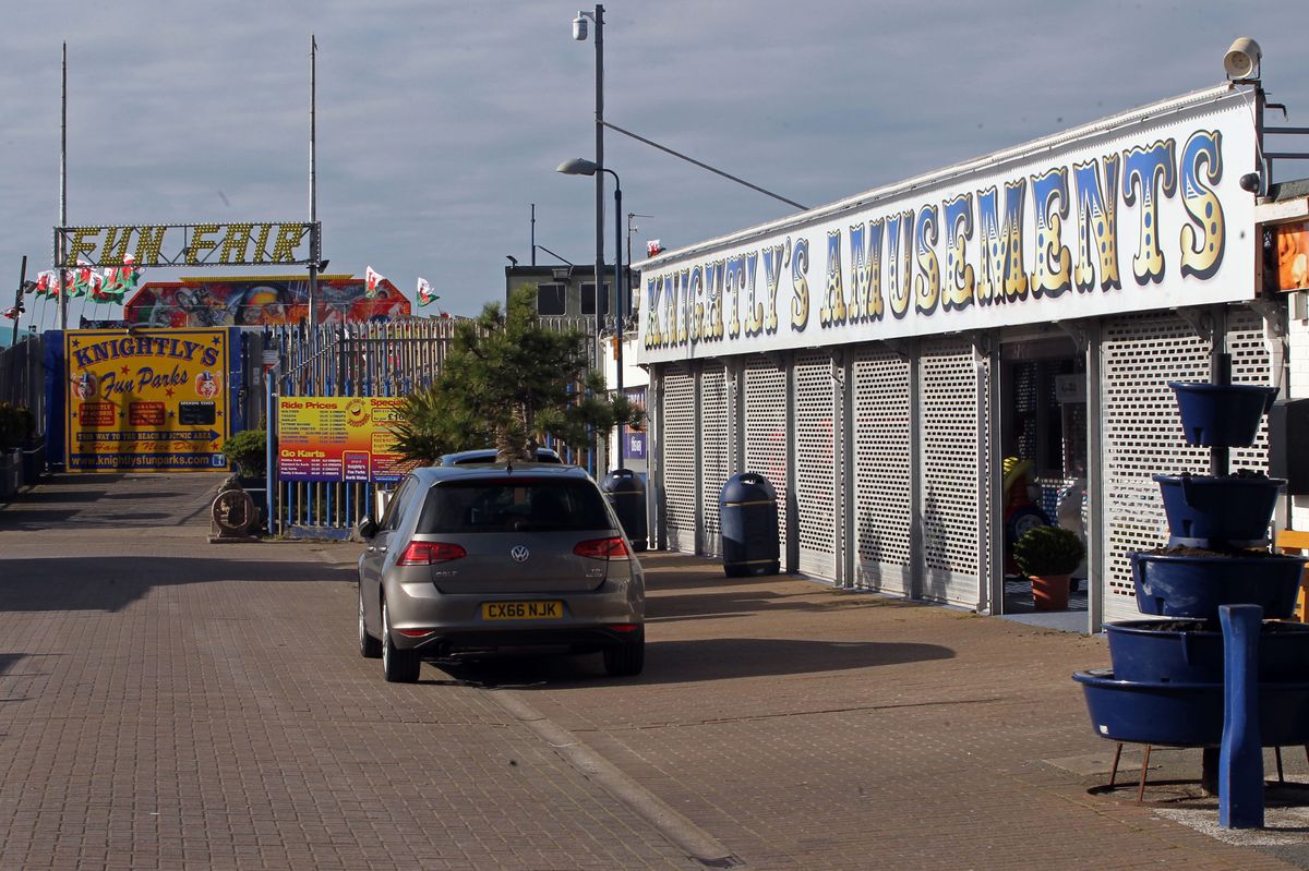 The image shows an exterior shot of the funfair in the resort 