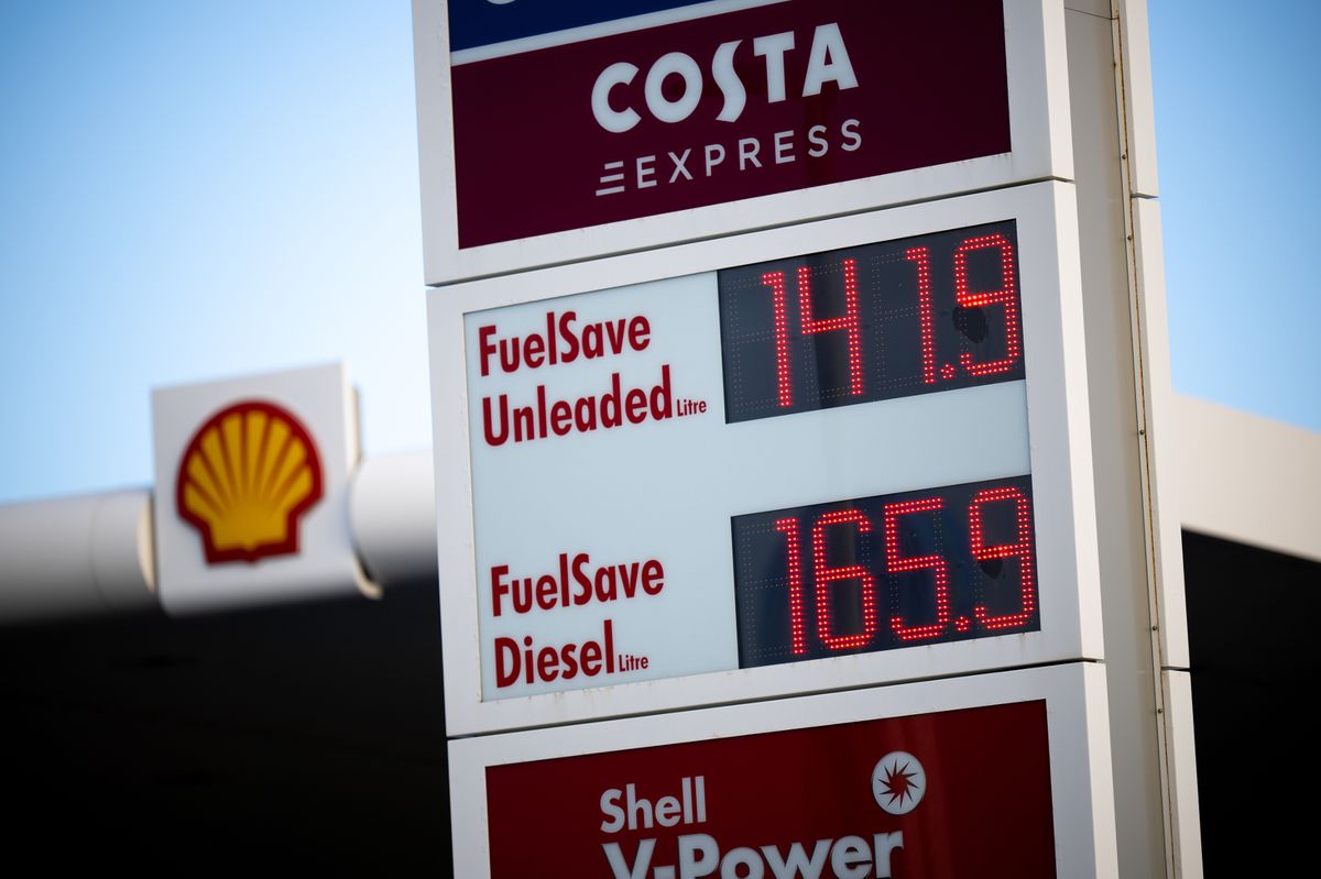 Petrol and fuel prices are displayed at a Shell petrol station