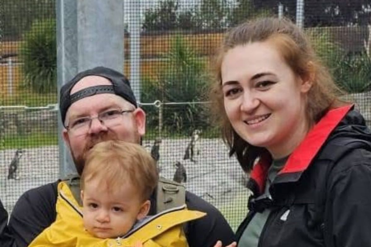 Freddie Quirk with his dad Adam and his mum Abbie