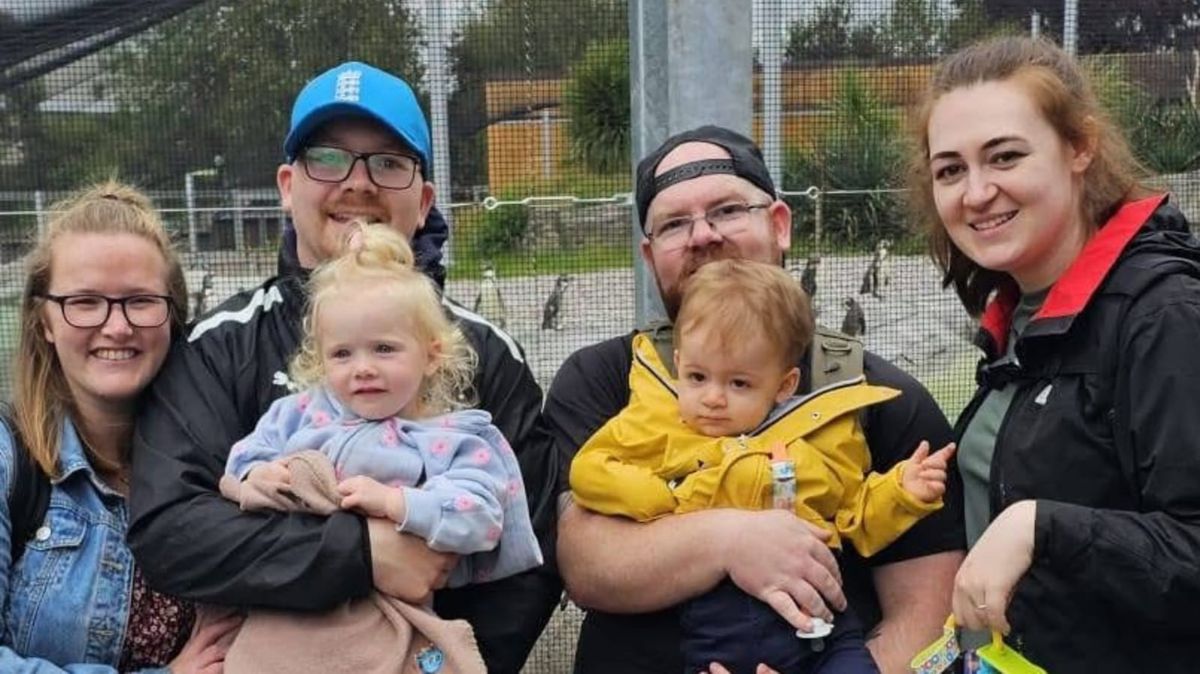Freddie Quirk (right) with his dad Adam and his mum Abbie, with their close friends Lydia and Tom Pennington and their daughter Hattie