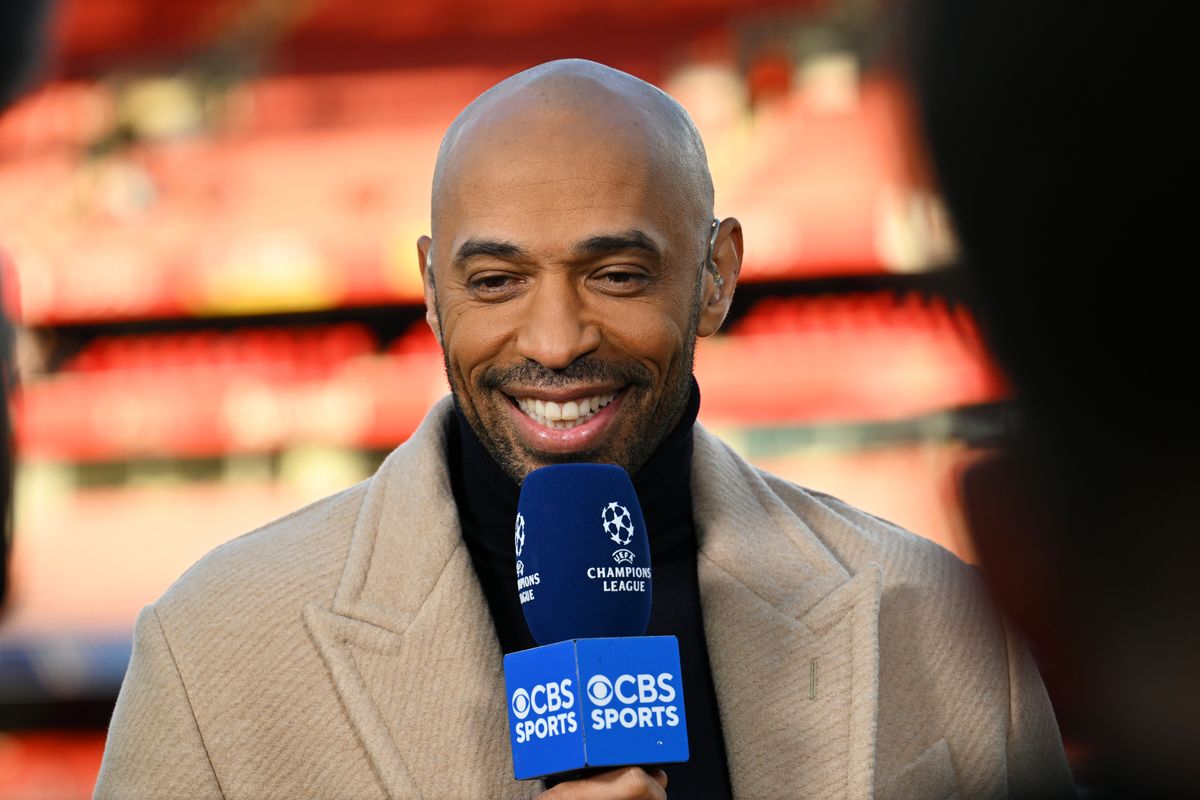 Thierry Henry reacts whilst speaking for CBS Sports prior to the UEFA Champions League 2024/25 Quarter Final First Leg match between Arsenal FC and Real Madrid C.F. at Arsenal Stadium on April 08, 2025 in London, England