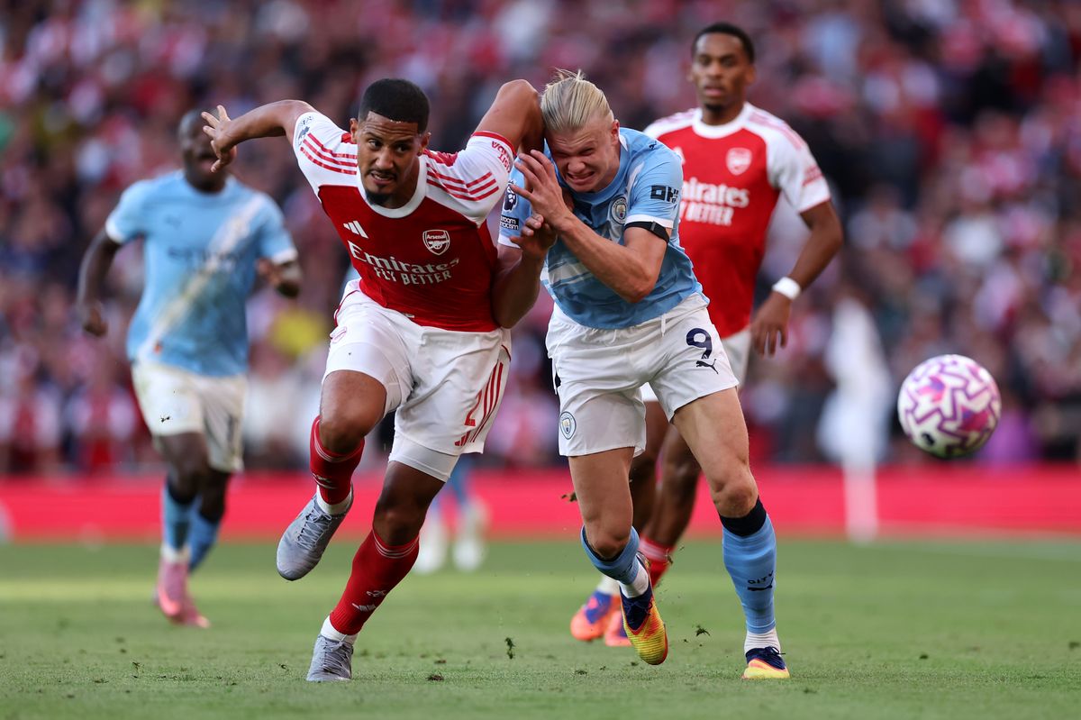 LONDON, ENGLAND - SEPTEMBER 21: William Saliba of Arsenal battles for possession with Erling Haaland of Manchester City during the Premier League match between Arsenal and Manchester City at Emirates Stadium on September 21, 2025 in London, England. (Photo by Justin Setterfield/Getty Images)