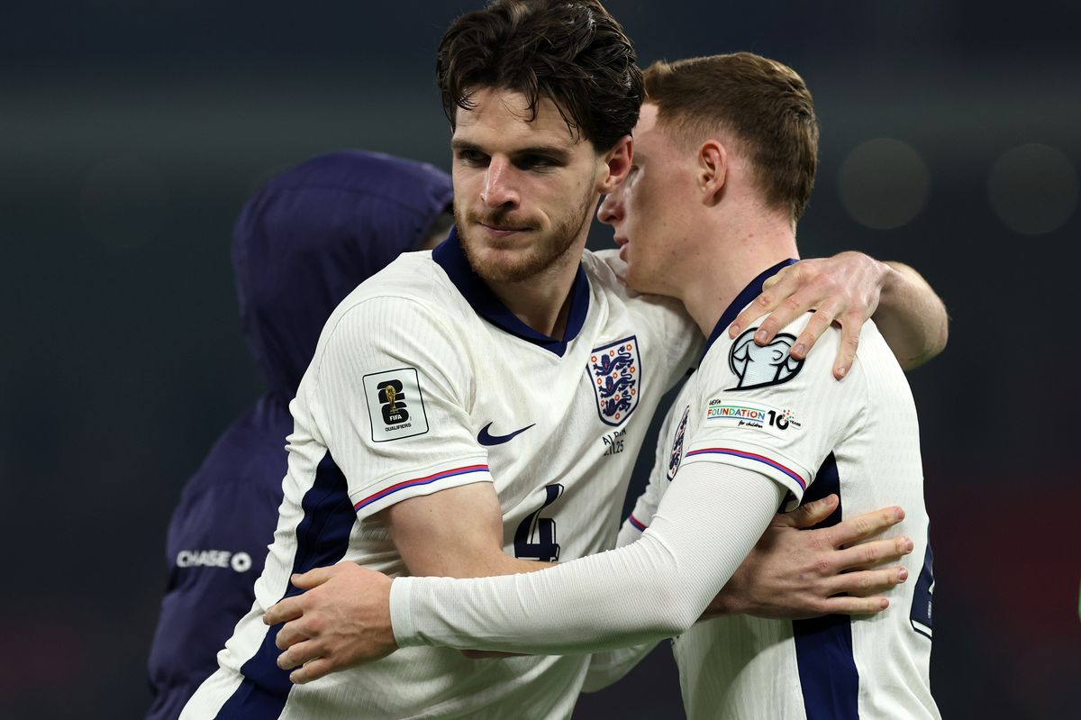 Declan Rice and Elliot Anderson of England interact following the FIFA World Cup 2026 qualifier match between Albania and England at Air Albania Stadium