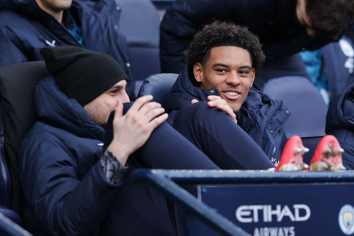 Floyd Samba of Manchester City watches on from the bench during the Emirates FA Cup fourth round match between City and Salford