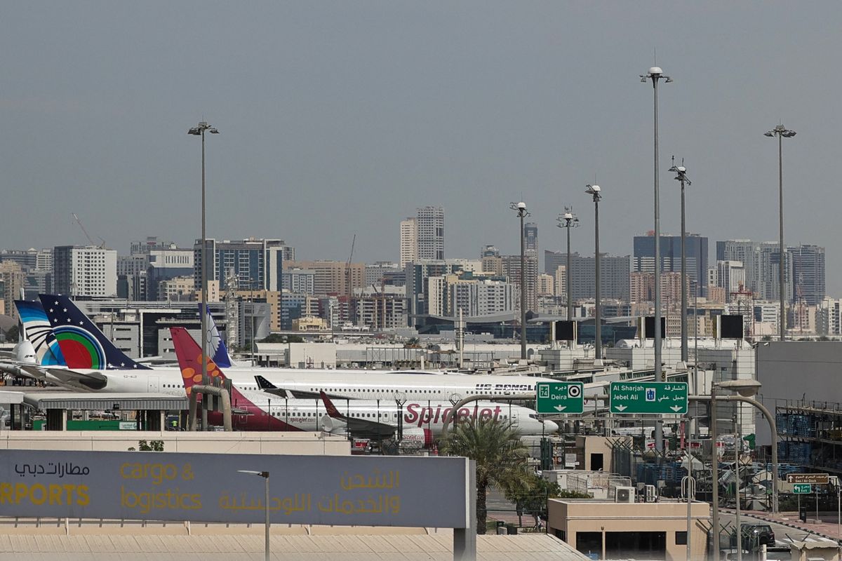 Passenger planes are parked at Dubai International Airport in Dubai (file photo)