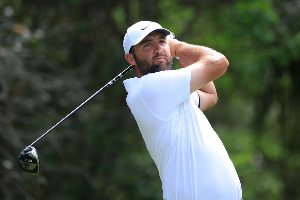 Scottie Scheffler swinging his golf club