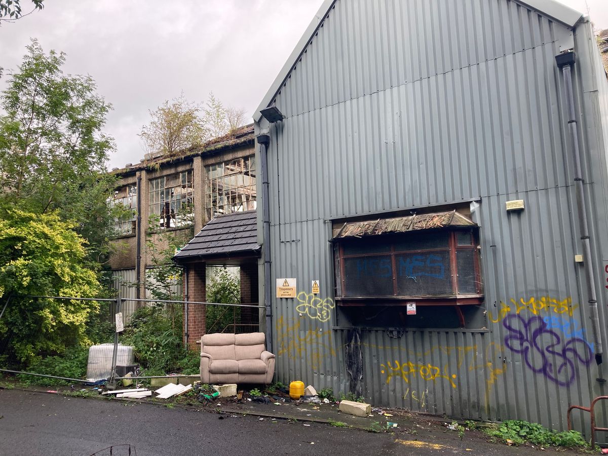 Waste dumped at the foot of Rochdale's former Turner Brothers factory