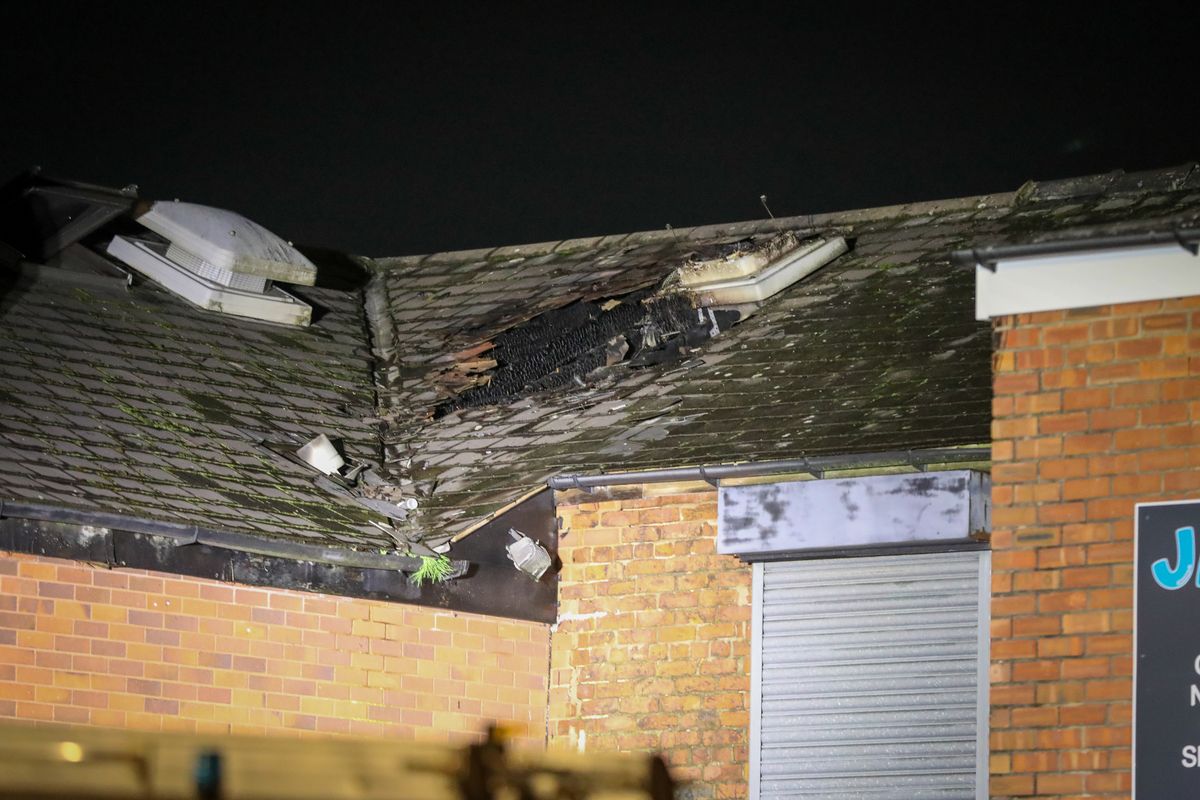 The roof was visibly damaged by the fire