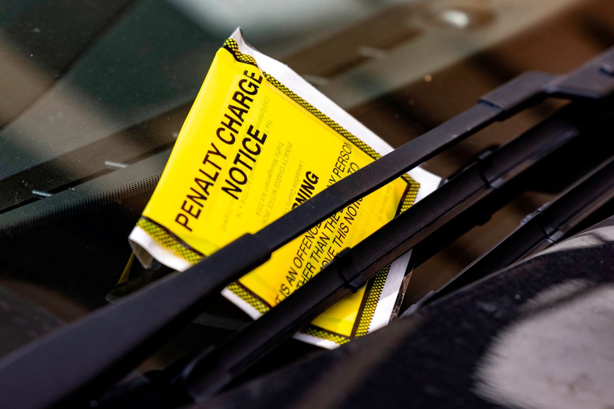 Parking ticket on a vehicle