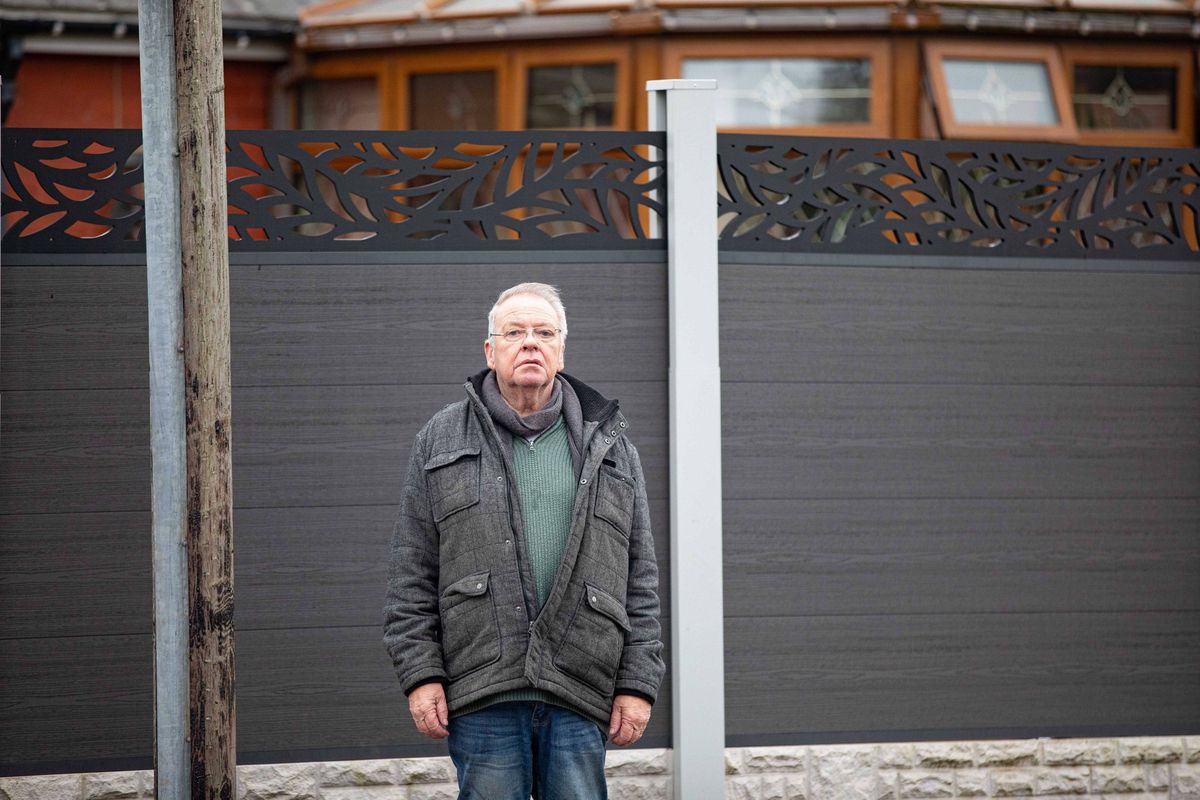 An elderly couple have blasted council bosses after being ordered to rip down a 6 ft tall fence built to stop people nosing into their house. David Hopwood, and his wife Denise, erected the grey composite fence in front of their Home in Farnworth, Bolton, Gtr Manchester, to provide privacy and security. March 9, 2026. // A retired couple have hit out at council chiefs who have ordered them them to rip down a £4,500 seven foot high fence - because of its colour. David and Denise Hopwood erected the 25 metre long, grey composite fence around their home after ripping up an old, nine-foot-high hedge that they were finding difficult to maintain. However a neighbour complained about its height forcing David, 67, and Denise, 66, to see retrospective planning permission. This week the couple, from Bolton, Gtr Manchester, were told permission had been refused because it was' out of touch with the character and appearance of the surrounding area.' The couple hit back saying that the hedge had become 'too difficult to maintain' at their age and was costing £800 a year to look after.