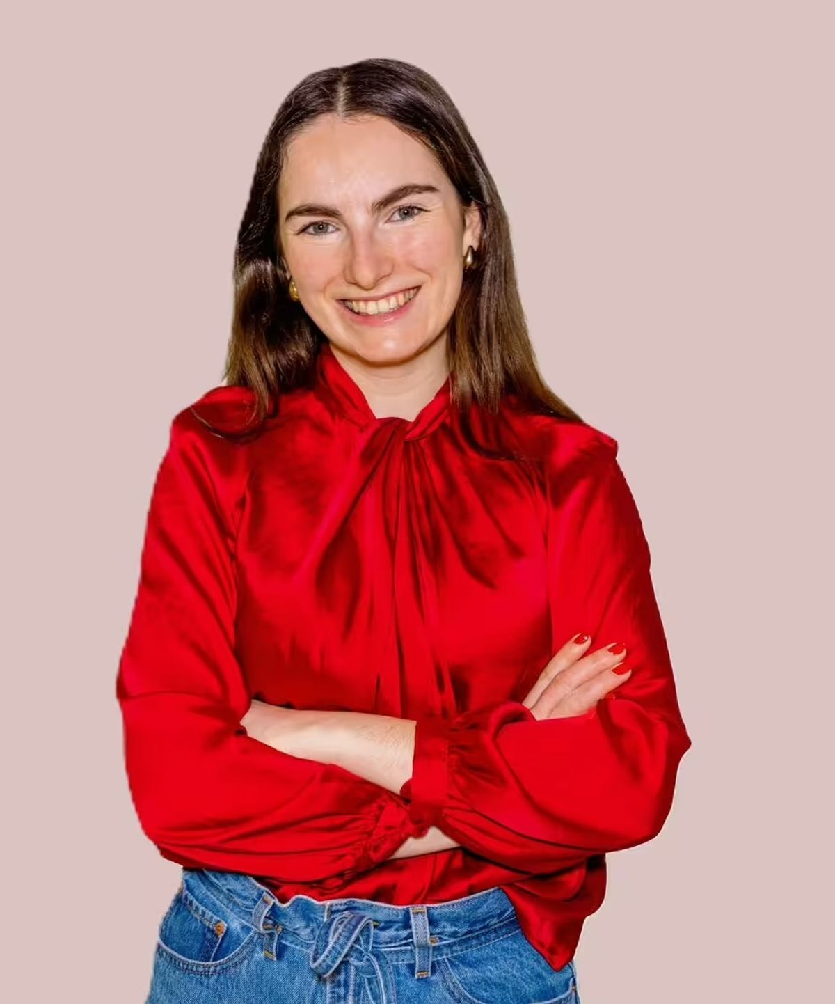 M&S' Louisa Brunt in a red blouse and blue jeans