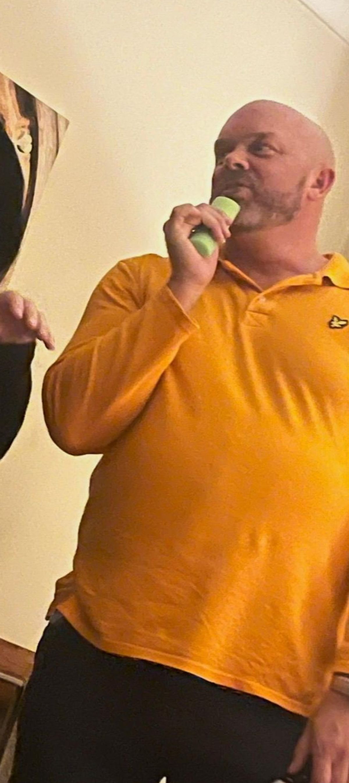 A man wearing yellow