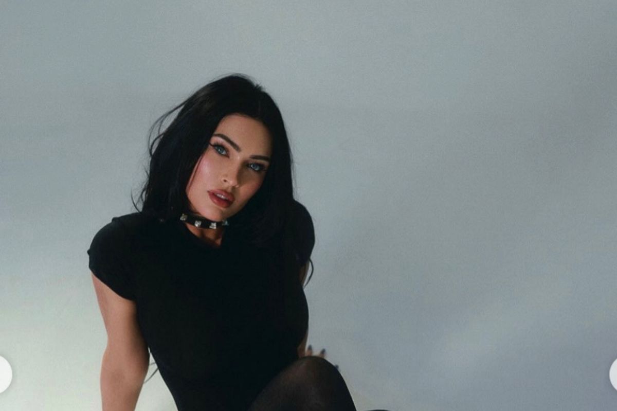 Megan posed for the photoshoot wearing an all-black look paired with high heels