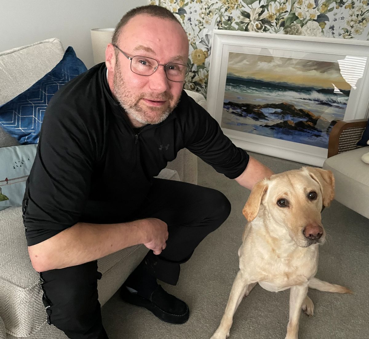 Rodney with his pet Labrador, Harry