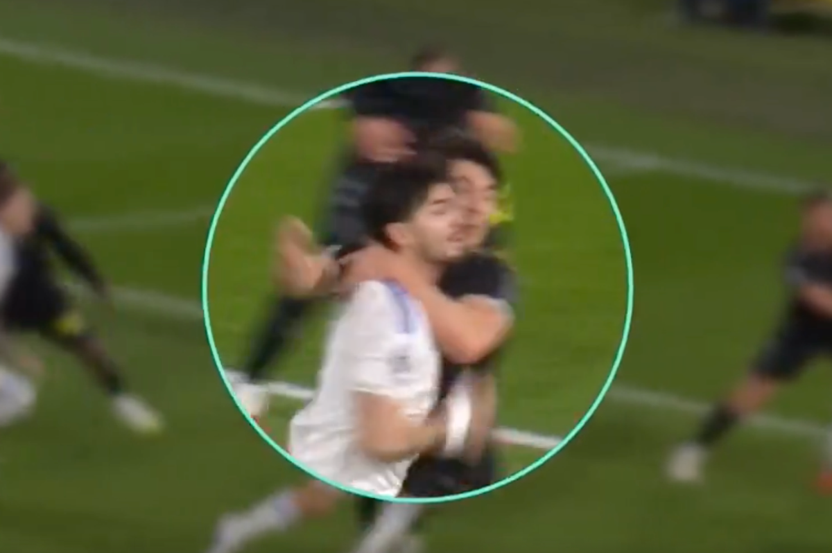 Luke O'Nien put two arms around the neck of Pascal Struijk during the set-piece