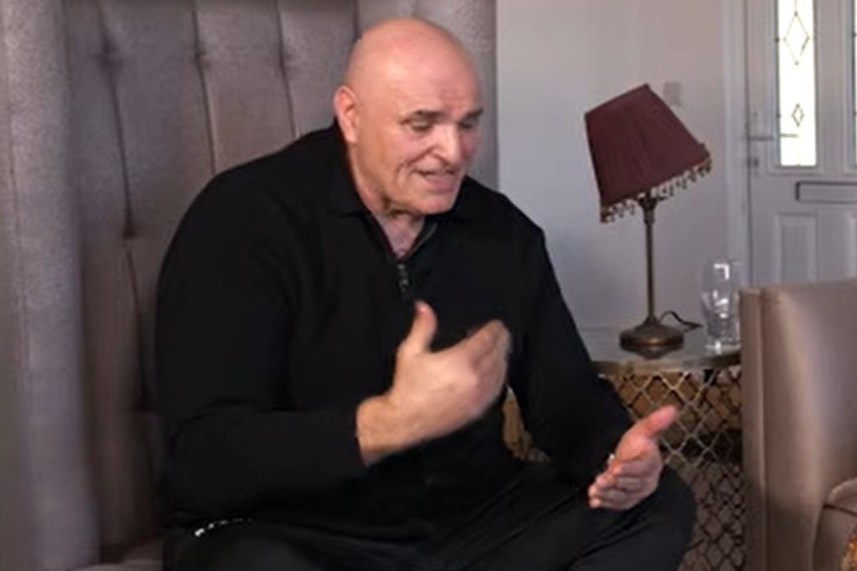 John Fury speaking in an interview while sat on a big chair