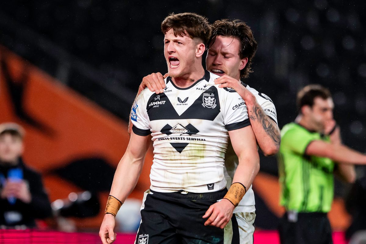 Hull FC's Davy LItten celebrates his try against York with Yusuf Aydin.