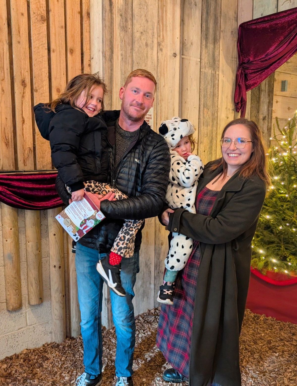 Anna and her fiancé Iain Lewis with their children Josephine, left, and Genevieve