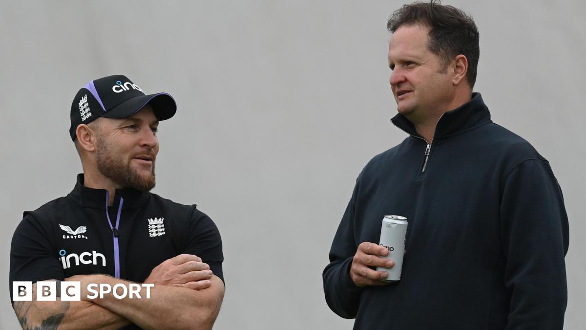 Brendon McCullum left, talks to Rob Key who is holding a drink