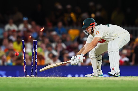 Cameron Green is bowled by Brydon Carse at the Gabba. 