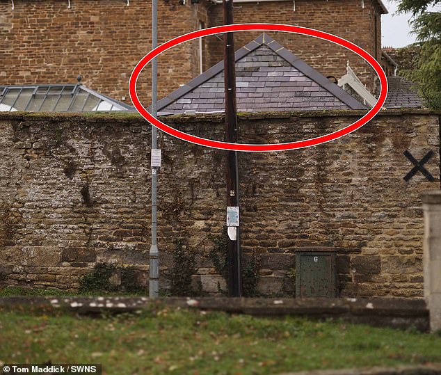 The slate roof of the pergola is visible from the road outside of Geri Halliwell-Horner and husband Christian Horner's property