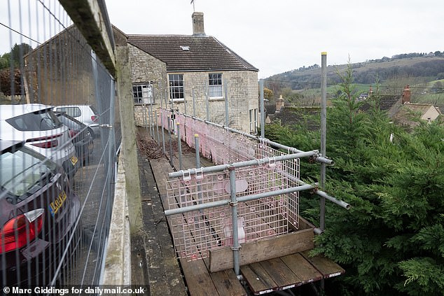 The car park being supported by the scaffolding, which is being paid for with taxpayer money