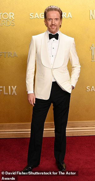 Damian Lewis opted for a cream blazer and black trousers