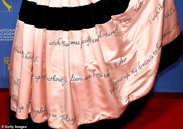 The internet sensation, 43, wore a stunning gown embroidered with the words of Sudanese children's hopes and dreams, in a nod to her advocacy for youths in Gaza, Sudan, Ukraine and the Democratic Republic of the Congo