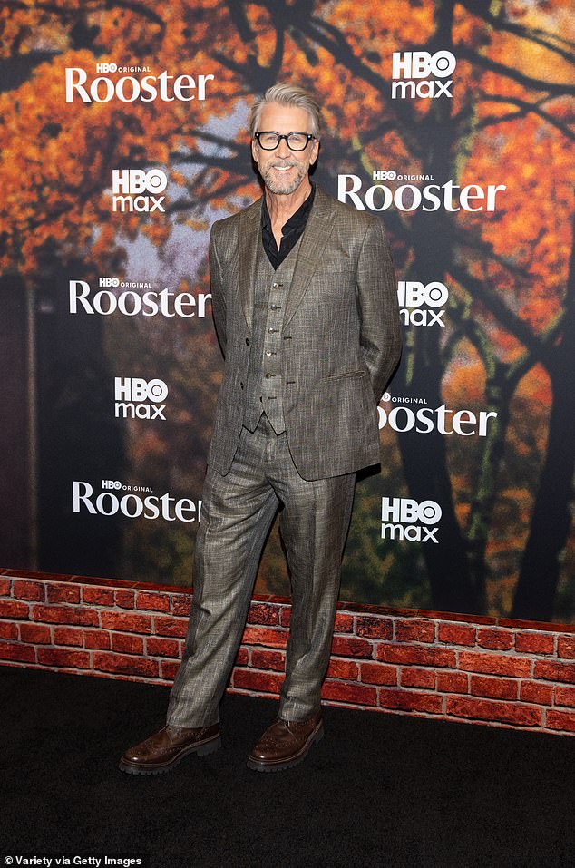 Succession star Alan Ruck looked snazzy in a mottled gray three-piece suit and brown wingtip derby shoes
