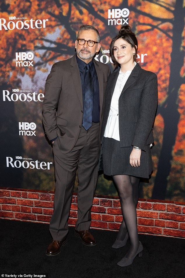 He was joined on the red carpet by Charly Clive, who plays his daughter. She wore a charcoal miniskirt and a matching sport coat with a white button-up blouse and dark heels